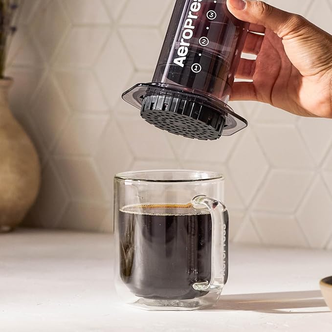 AeroPress Clear Black Coffee Press - All-in-One French Press, Pour-Over & Espresso Style Manual Brewer, 2 Min Brew for Less Bitterness, More Flavor, Small Portable Coffee Maker, Travel & Camping