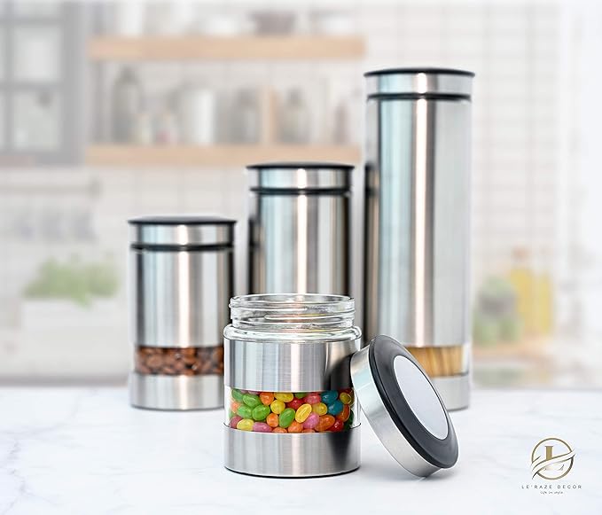Le'raze Airtight Glass Canister Set of 4 with Stainless Steel Sleeve for Kitchen Counter - Food Storage Containers with Glass Window and Airtight Lids - Pantry Storage and Organization Set